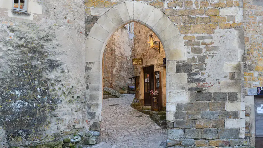 Dark stone archway in the historical quarter